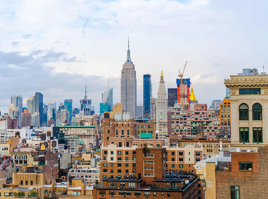 photography of assorted-color buildings during daytime, aerial view photography of city building HD wallpaper