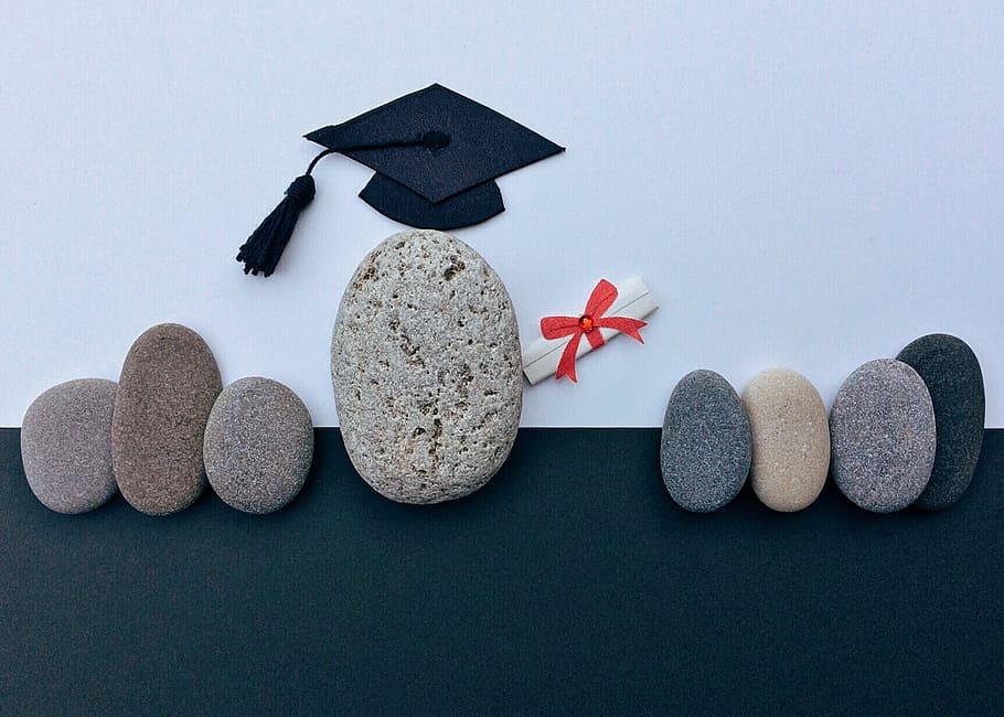 eight assorted sea stones, graduation, diploma, education, achievement