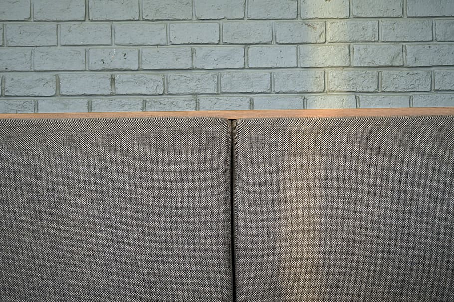 gray brick wall, cushion, fabric, light, seats, chair, coffee shop HD wallpaper