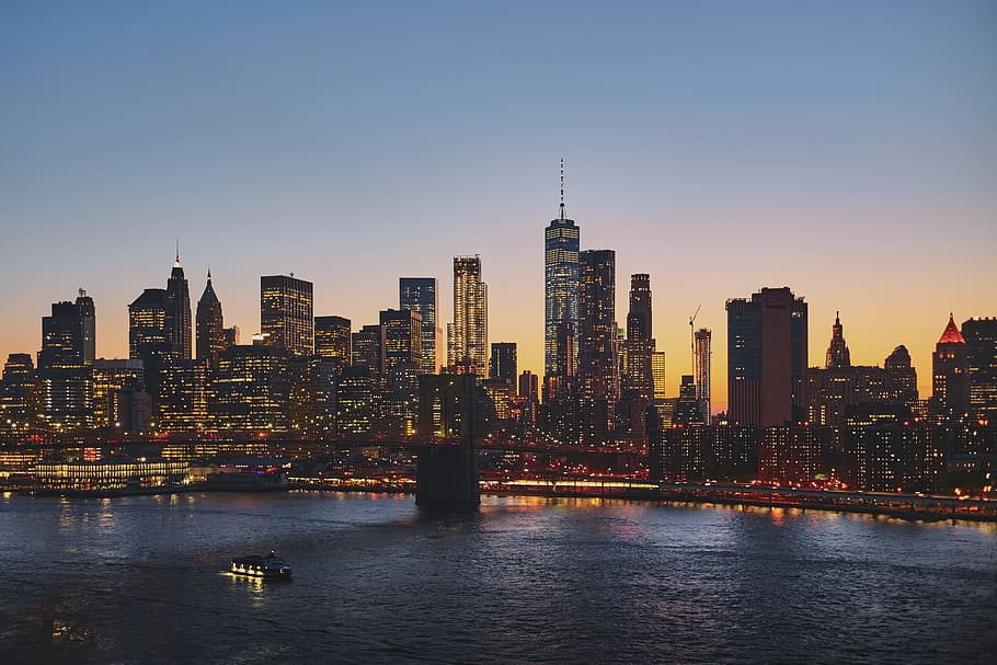 panoramic photography of Brooklyn Bridge, tower bridge across the body of water during sunset HD wallpaper
