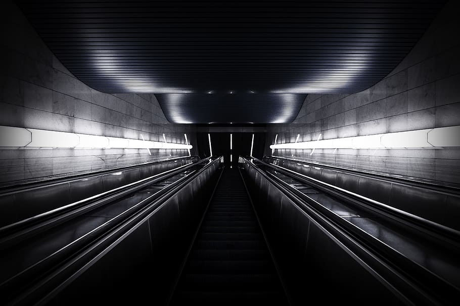 photo of underground tunnel, train substation interior, architecture
