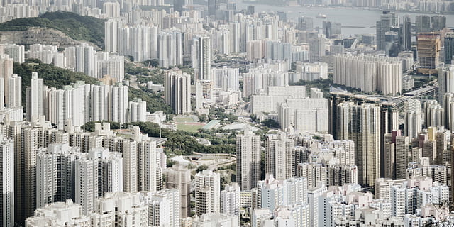 sunlight over city buildings, aerial photography of high rise buildings at daytime HD wallpaper