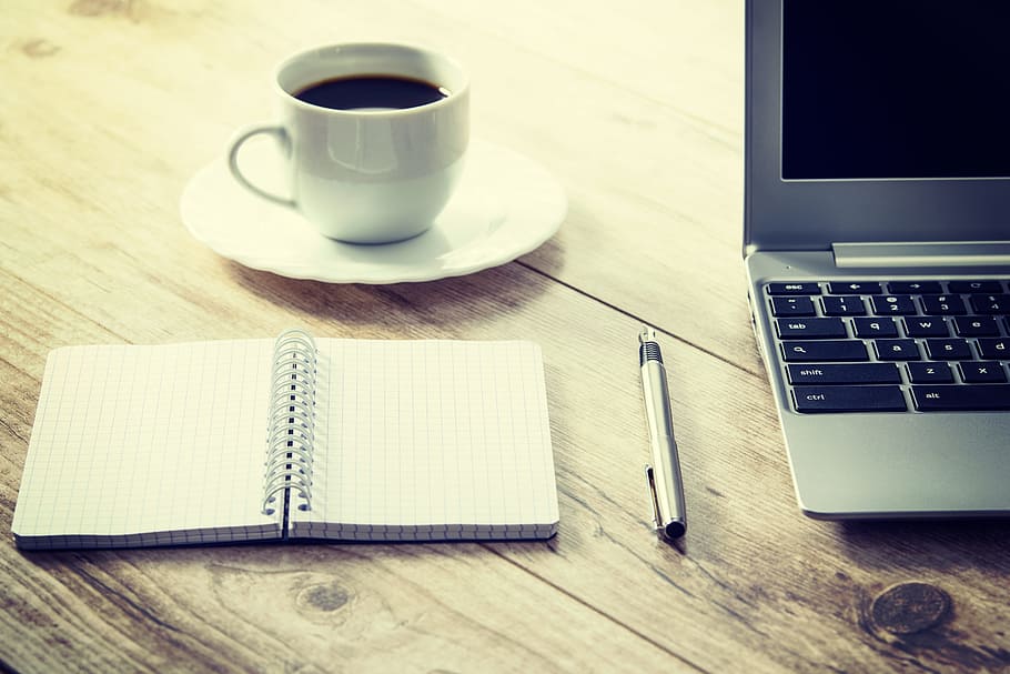 white cup and saucer beside gray laptop computer, coffee, desk HD wallpaper