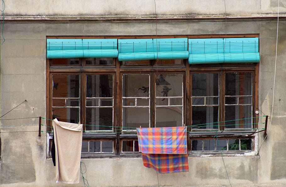 blue and red towel hanging near window, closed brown wooden clear glass window HD wallpaper
