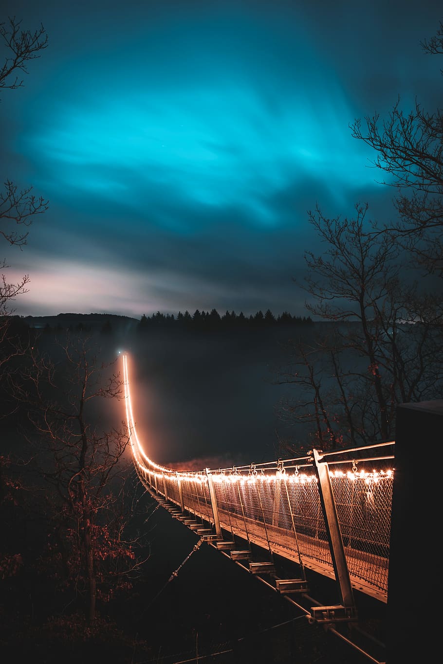 brown suspension bridge with light during nighttime, photography of bridge with lights during night time HD wallpaper
