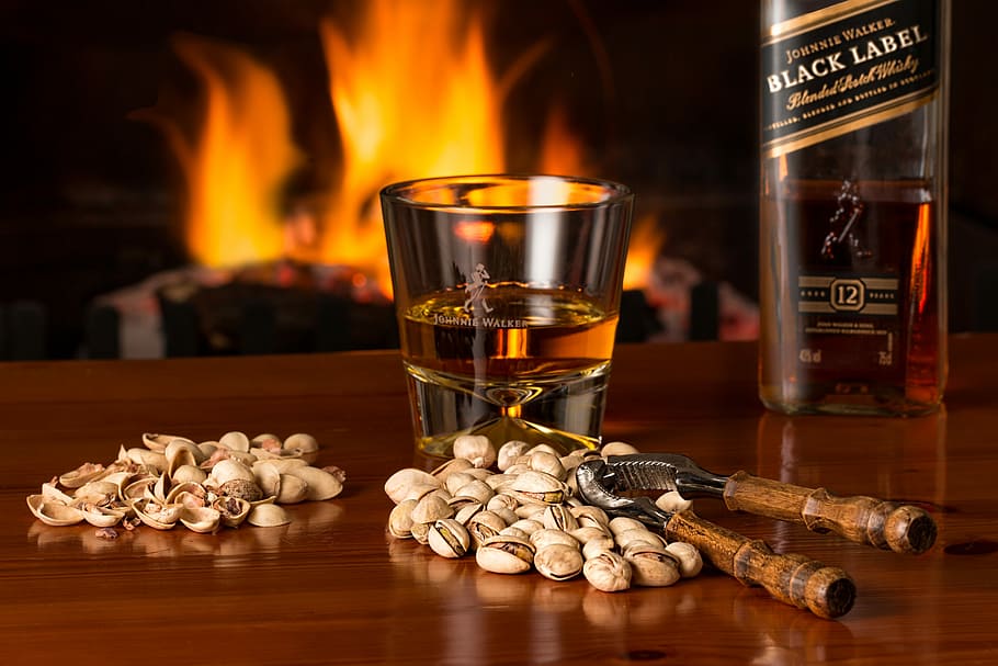 Black Label whisky, pistachio nuts, fireside, alcohol, beverage