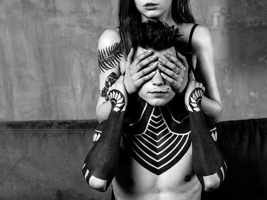 woman covering man's eye, gray scale photography of man and woman HD wallpaper