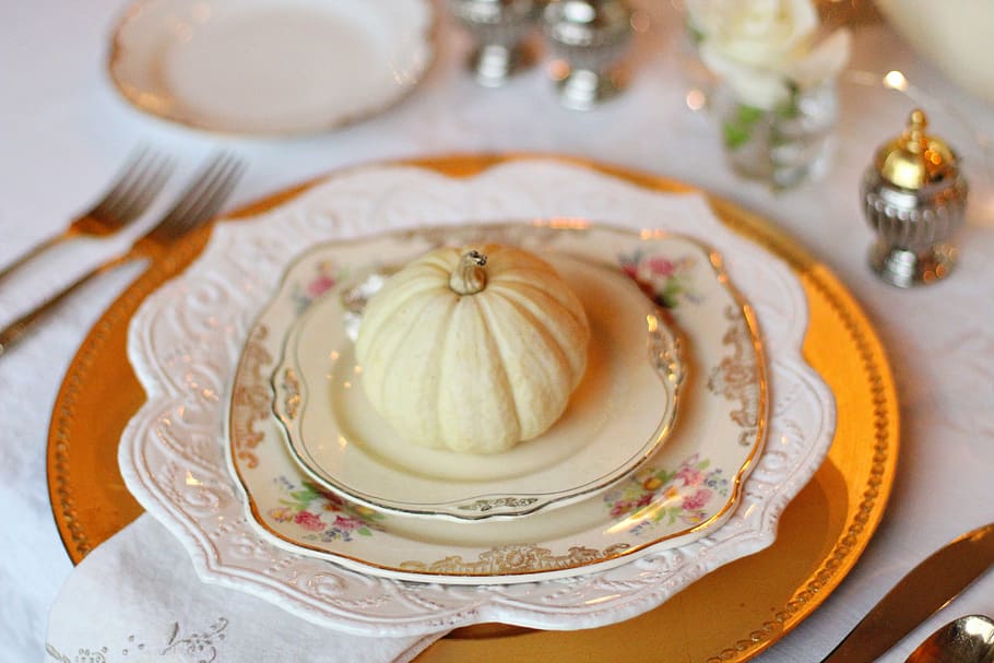 small artificial squash on white ceramic saucer with plates HD wallpaper