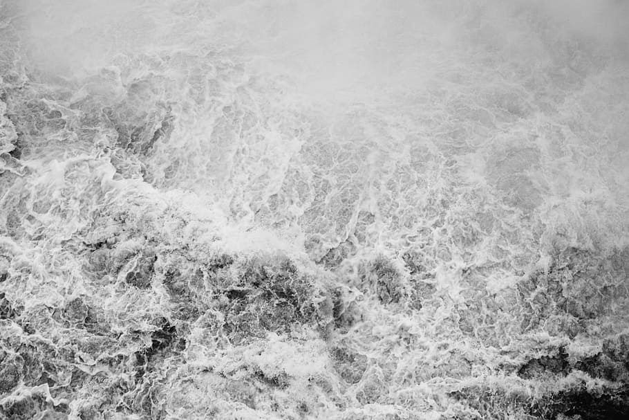 grayscale photograph of rushing water, aerial photography of body of water HD wallpaper