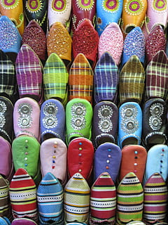 close up photo of assorted color  embossed printed shoe lot HD wallpaper