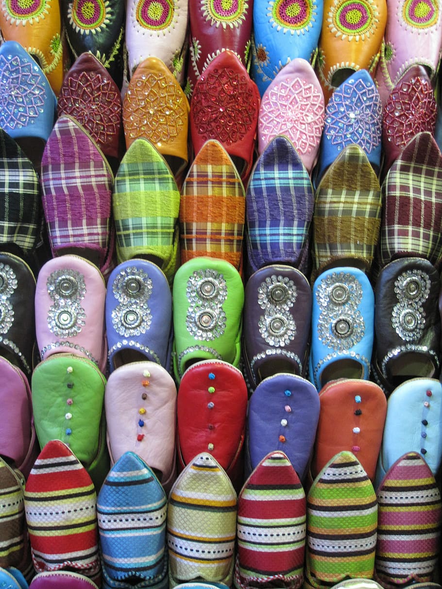 close up photo of assorted color  embossed printed shoe lot HD wallpaper