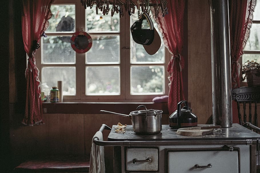 silver pot near window, white and brown wood burner stove with cooking wares near window HD wallpaper