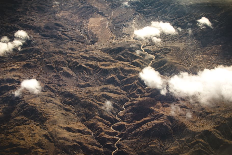 aerial view of mountainous region, bird's eye photo of mountain and clouds HD wallpaper