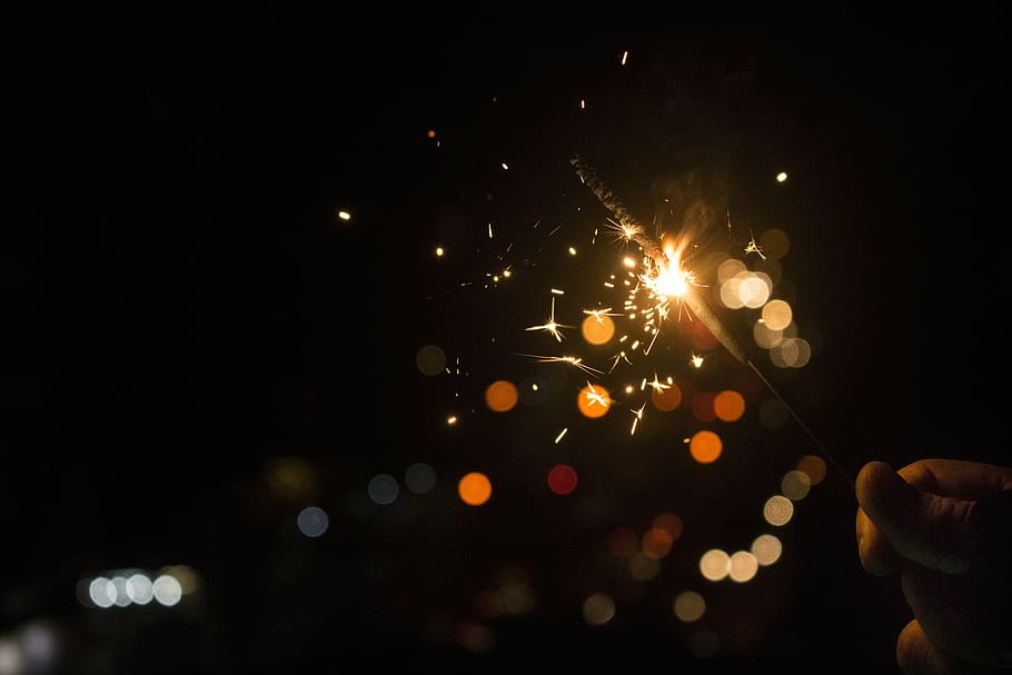 photo of bokeh lights, dark, sparklers, night, illuminated HD wallpaper
