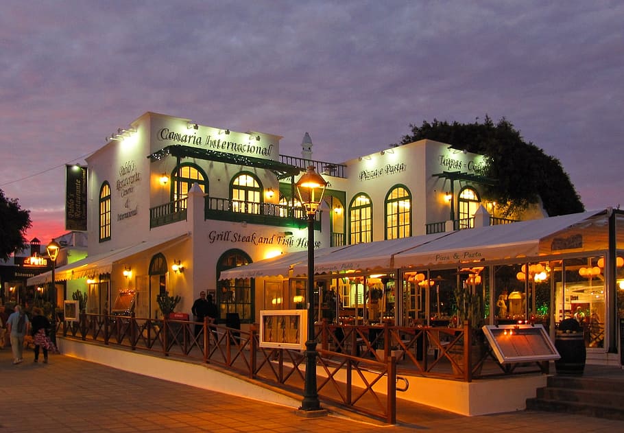 white painted building during night time, lanzarote, hotel HD wallpaper