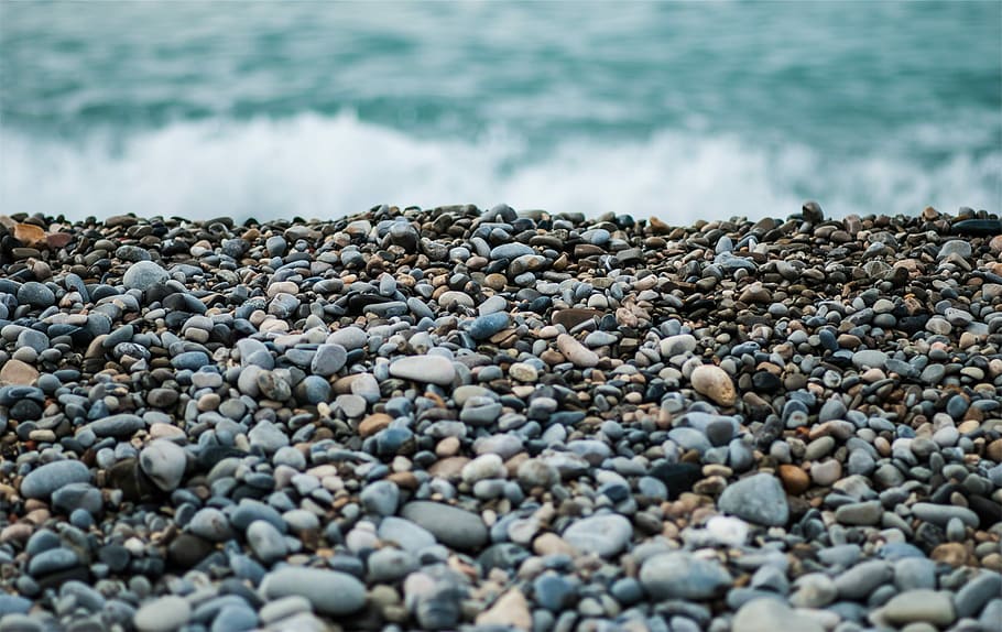 gray and black stones near body of water, beach, blue, sea, shore HD wallpaper