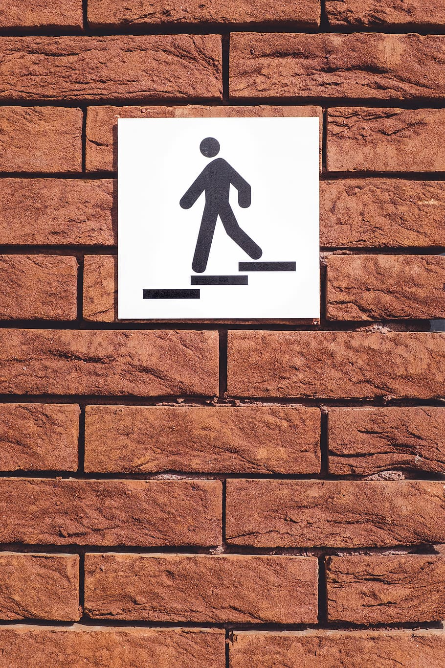 white and black signage mountain on wall, stairs signage mounted on concrete brick wall HD wallpaper