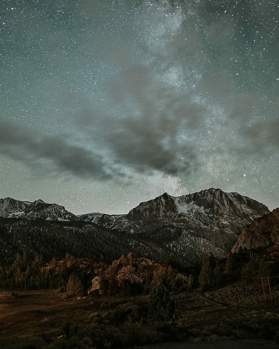 landscape photography of mountains and stars, photography of brown and gray mountains under milky way HD wallpaper