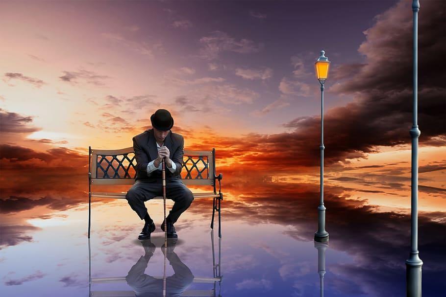 man sitting on bench while holding walking cane, sunset, reflection HD wallpaper