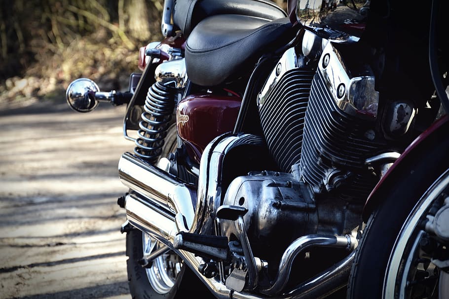 selective focus photography of black and gray v-twin engine motorcycle on road HD wallpaper