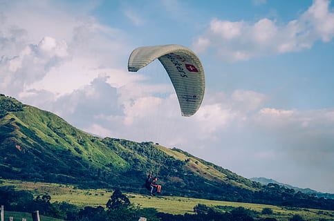 paraglider under blue sky, person in a parachute, flying, extreme Sports HD wallpaper