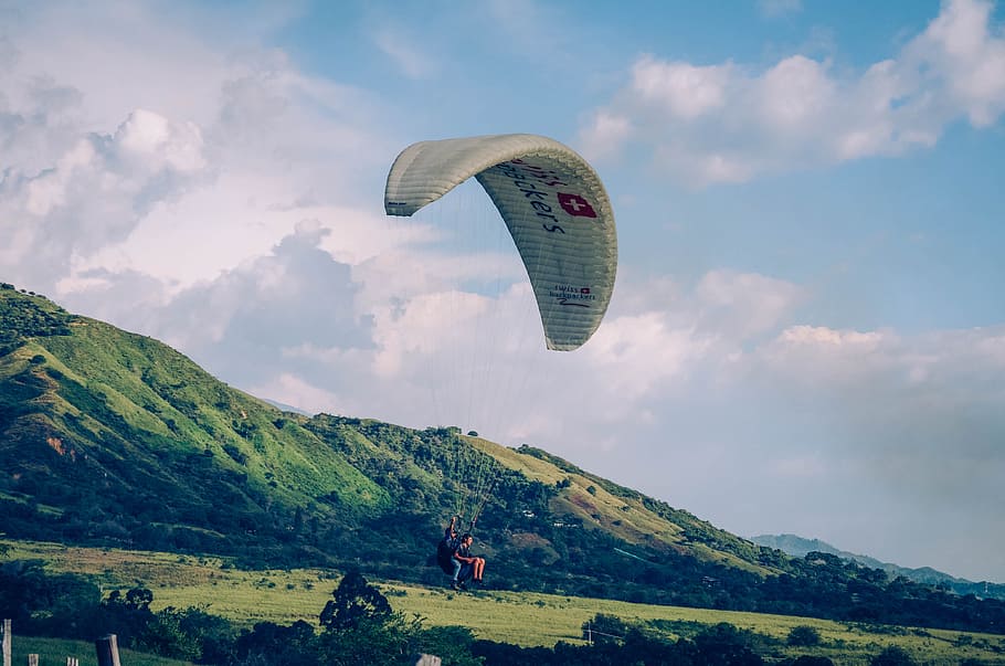 paraglider under blue sky, person in a parachute, flying, extreme Sports HD wallpaper