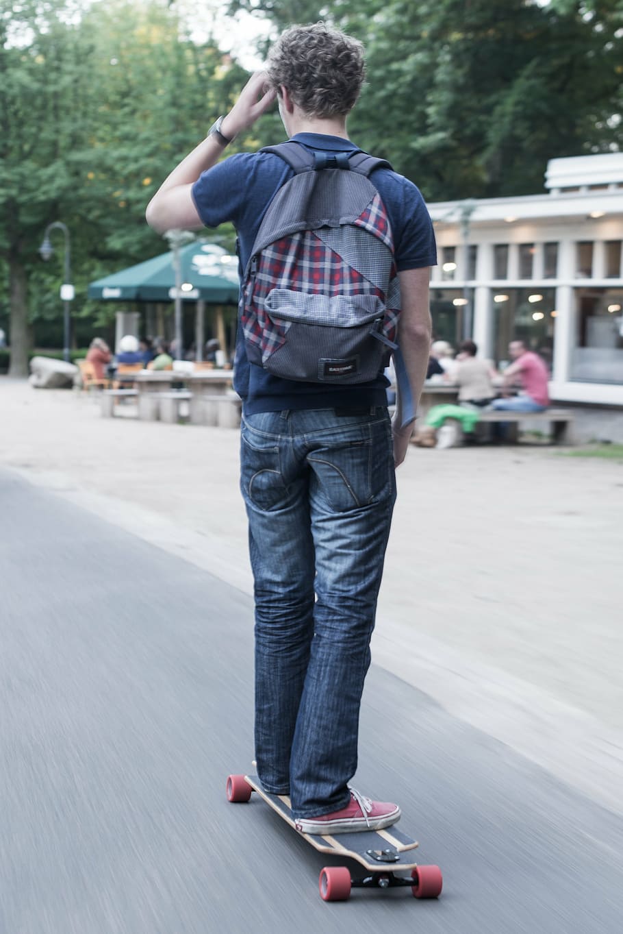 man doing skateboarding on road, park, backpack, skater, lifestyle HD wallpaper