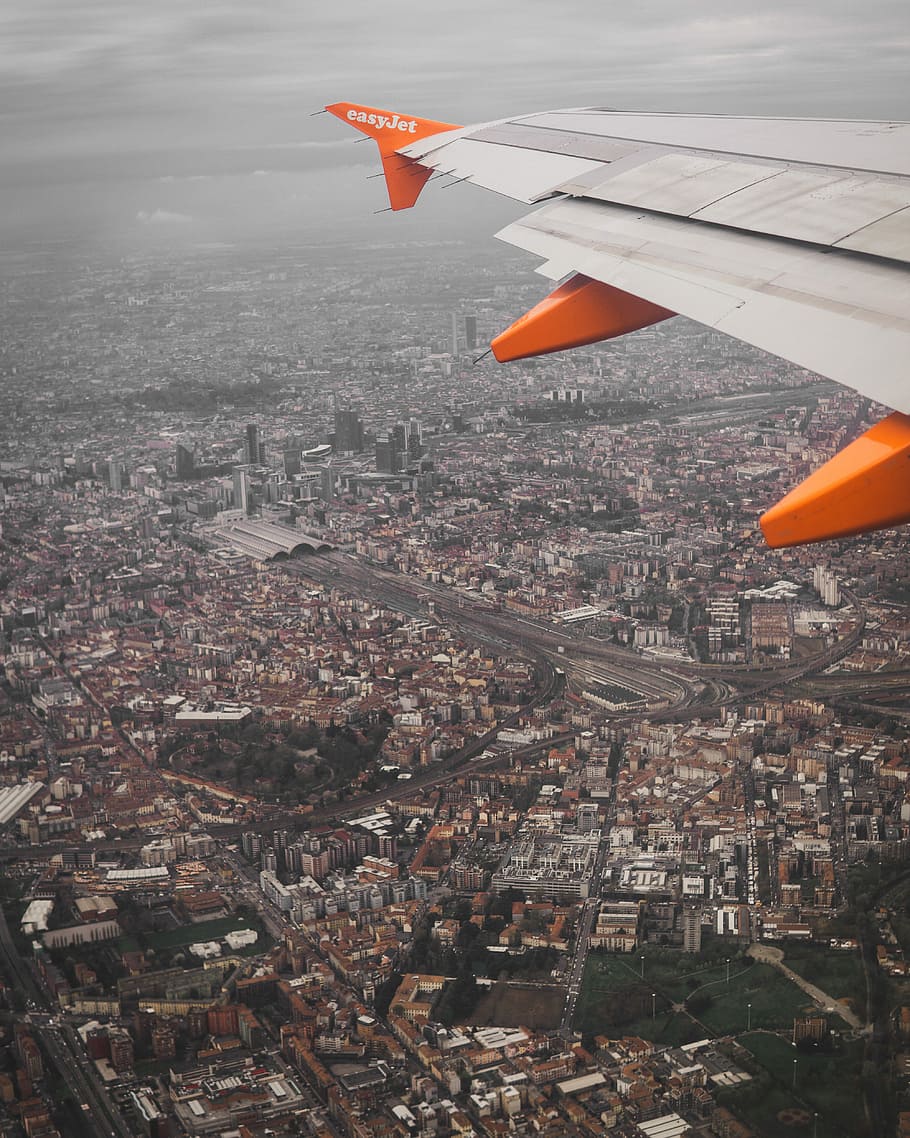 gray airplane photo, aerial photography of cityscape, building HD wallpaper