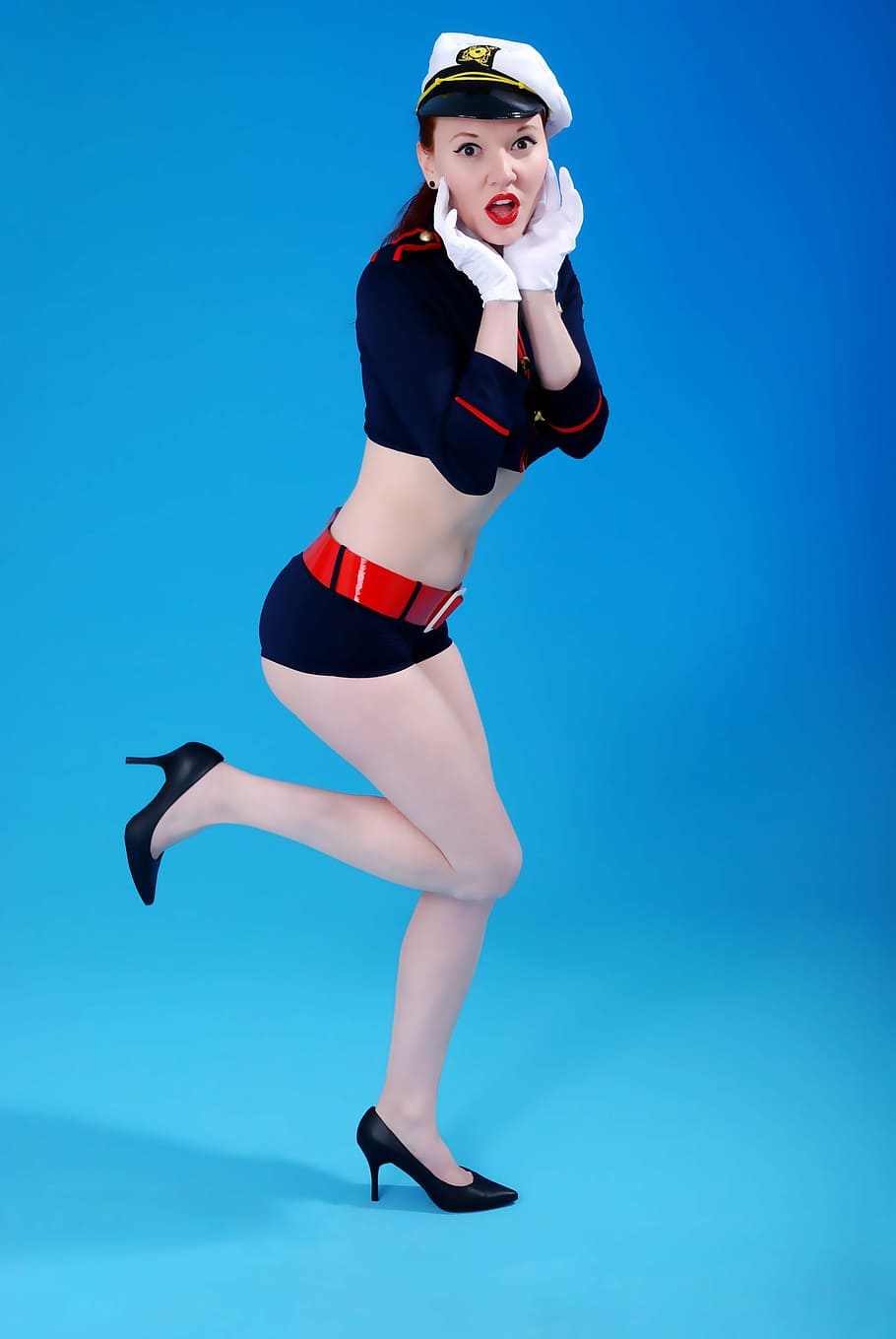woman wearing blue and red sailor costume, pin up, retro, vintage