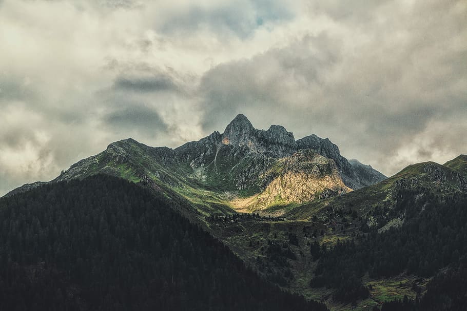 landscape photography of mountain with forest, aerial photography of mountain under cloudy sky at daytime HD wallpaper