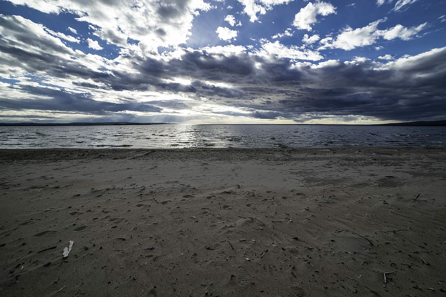 HD wallpaper: Beach and Shoreline with clouds and sky with sun, lake