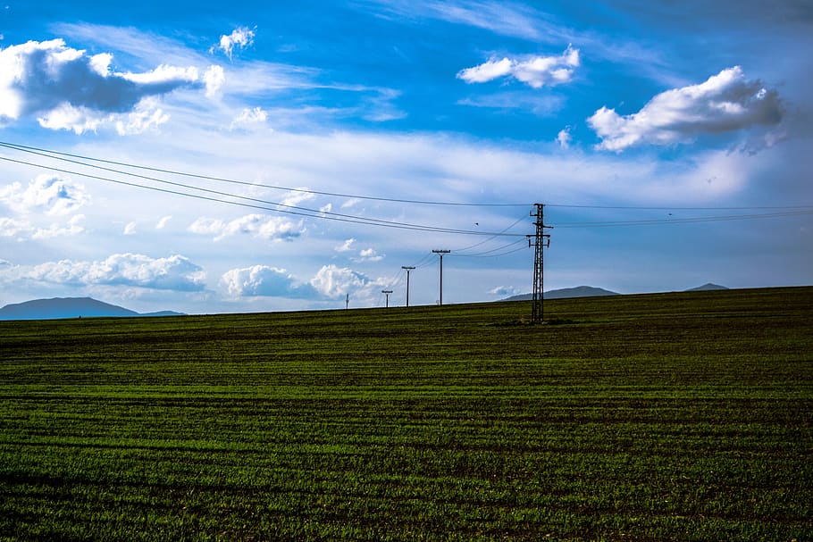 field, columns, electrics, sky, clouds, heaven, blue, grass HD wallpaper