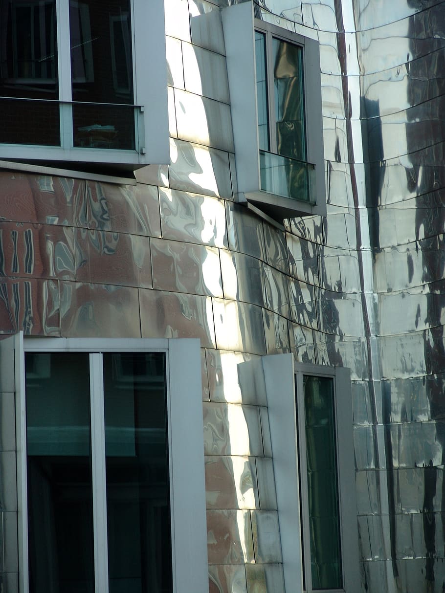 facade, glass facade, skyscraper, mirroring, glass window, discs HD wallpaper