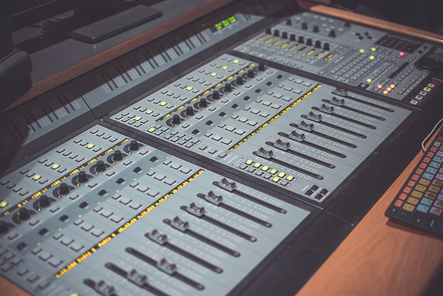 gray audio mixer on table, pro studio, music studio, console