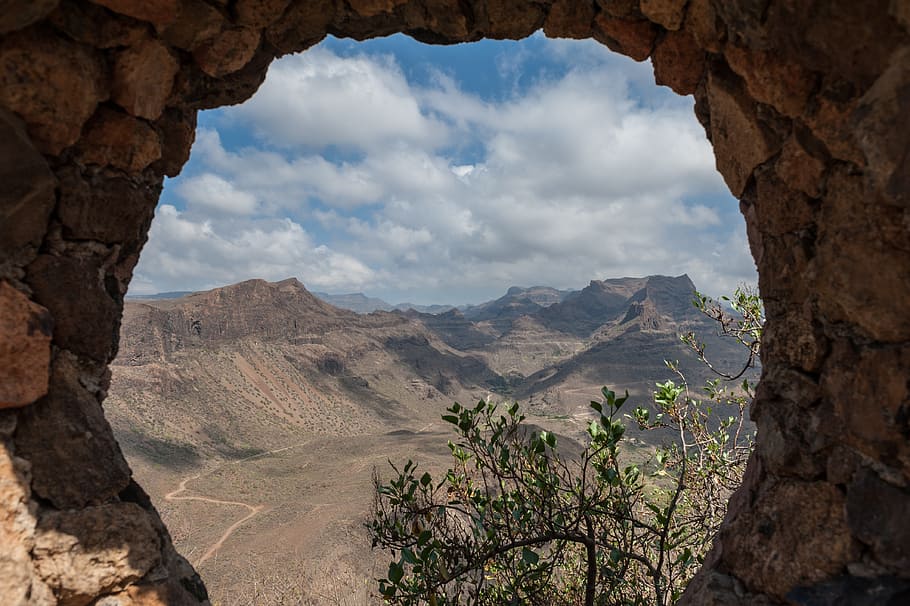 mountains, hole, clouds, sky, rock, destination, landscape HD wallpaper