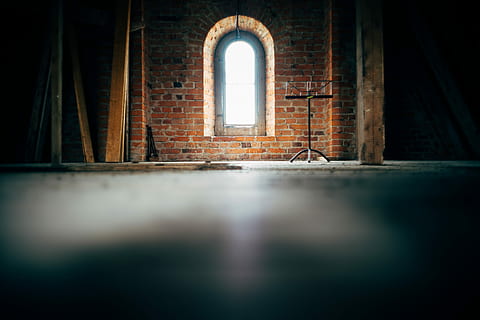 low-angle photo of concrete wall and window, black music stand in front of brown brick wall HD wallpaper