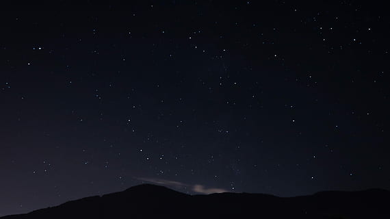 silhouette of mountain under starry night, mountain and star photo during nightime HD wallpaper
