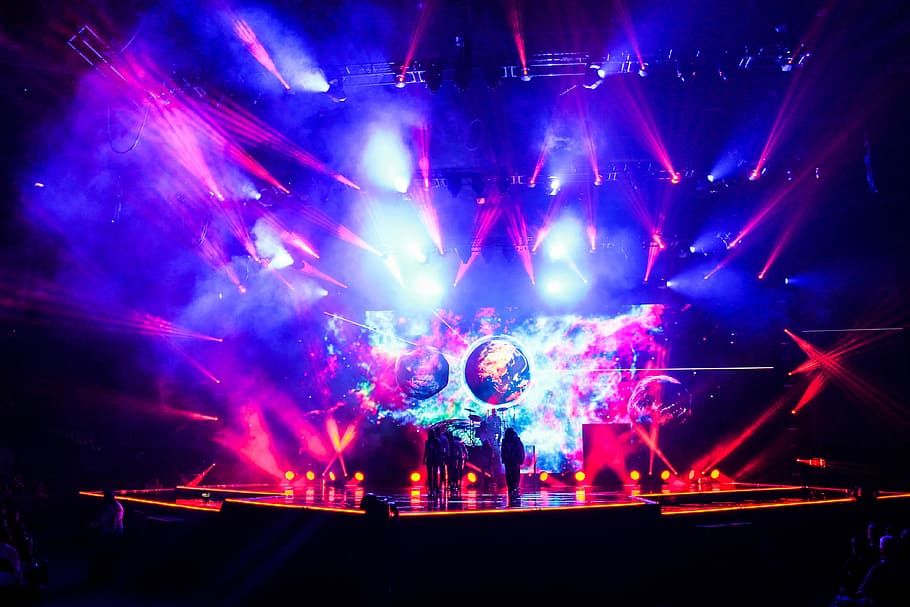 rave concert, band group on stage doing concert, show, lights