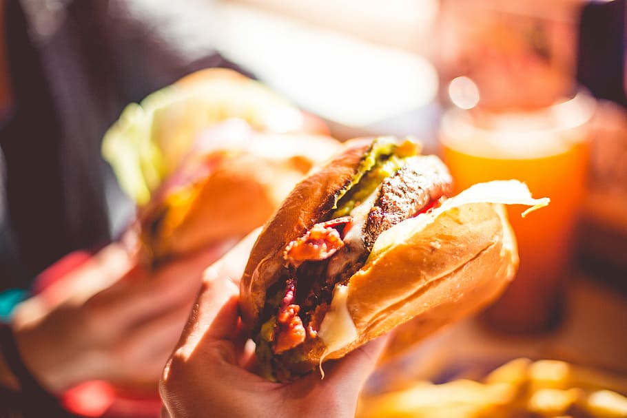 Enjoying a Tasty Burger, close up, dinner, eating, food, foodie, HD wallpaper