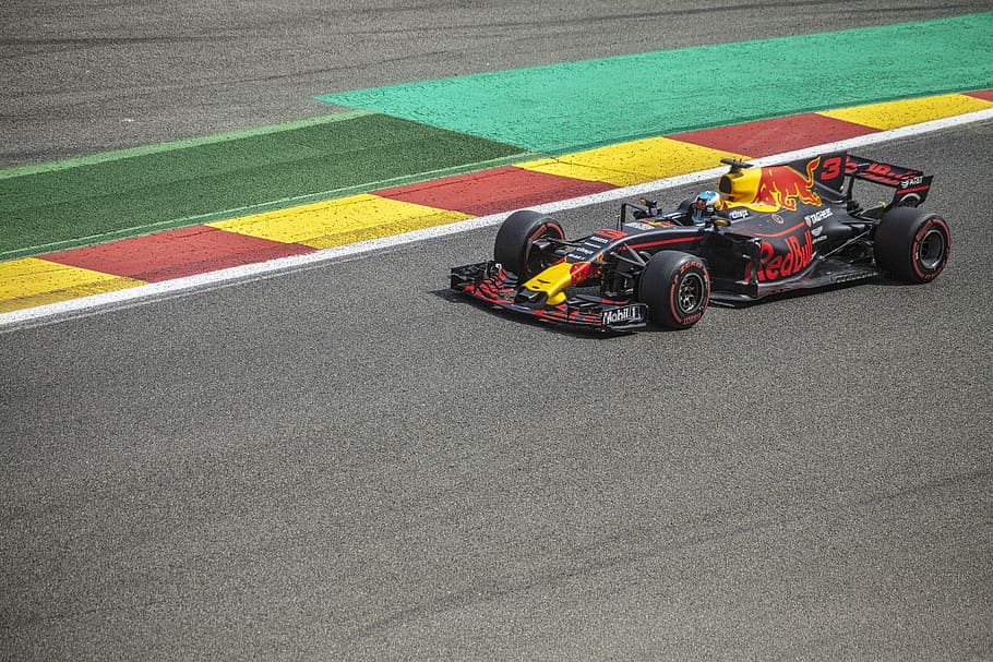 black and yellow Red Bull F1 racing in concrete track, black and yellow F1 racer on road, HD wallpaper