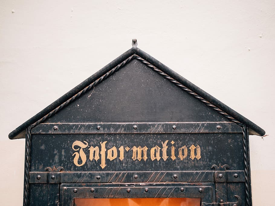close-up photography of Information signage, black wooden house miniature HD wallpaper