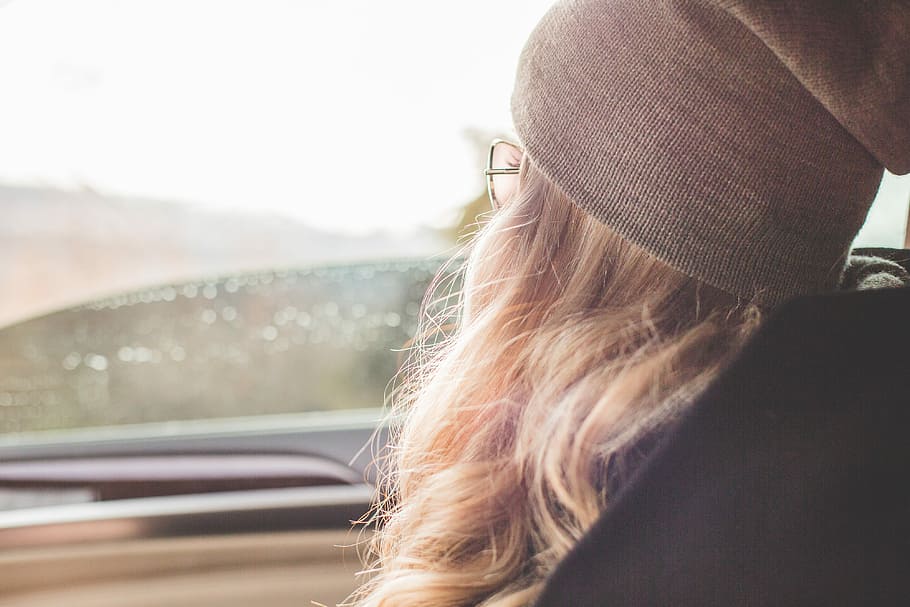 Young & Beautiful Blonde Girl Looking Out of Car Window, autumn