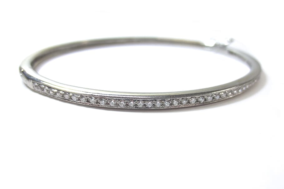jeweled silver-colored bracelet, diamonds, cuff, hinged, wrist