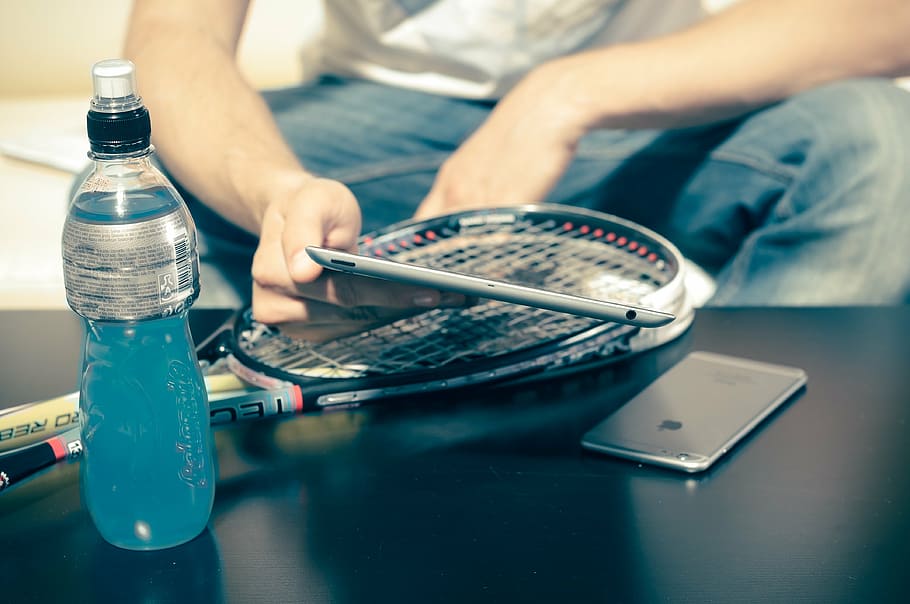 person holding iPad beside space gray iPhone 6, squash, sport HD wallpaper