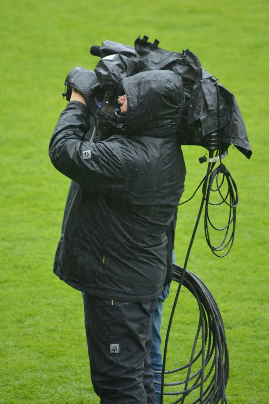 man, filming, camera, cameraman, job, people, rain, raincoat HD wallpaper