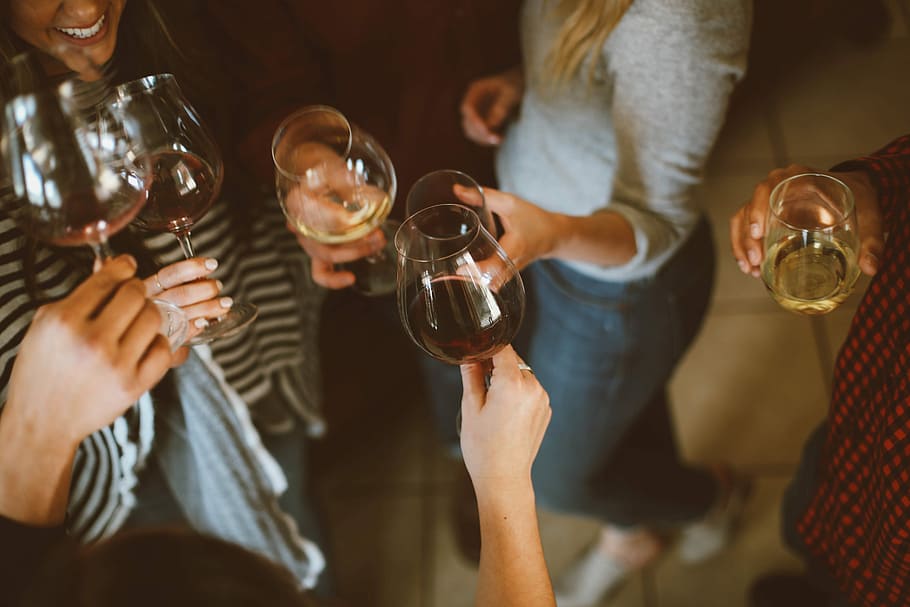 group of people tossing wine glass, shallow focus photography of wine glasses HD wallpaper