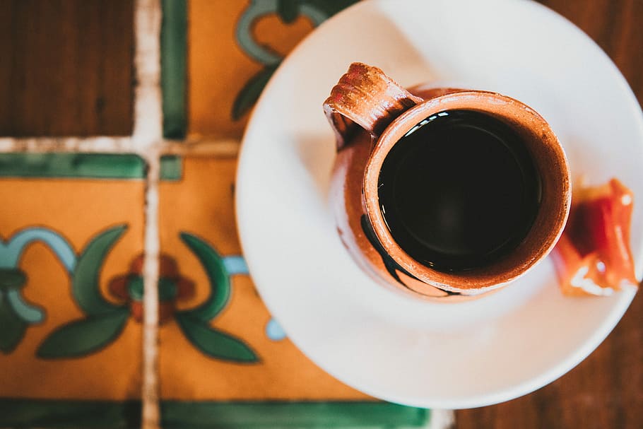 brown ceramic mug with coffee on white ceramic saucer, filled teacup on table HD wallpaper