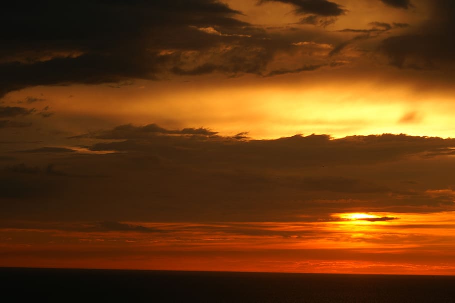sunset, ocean, twilight, clouds, orange red sky, dark clouds HD wallpaper