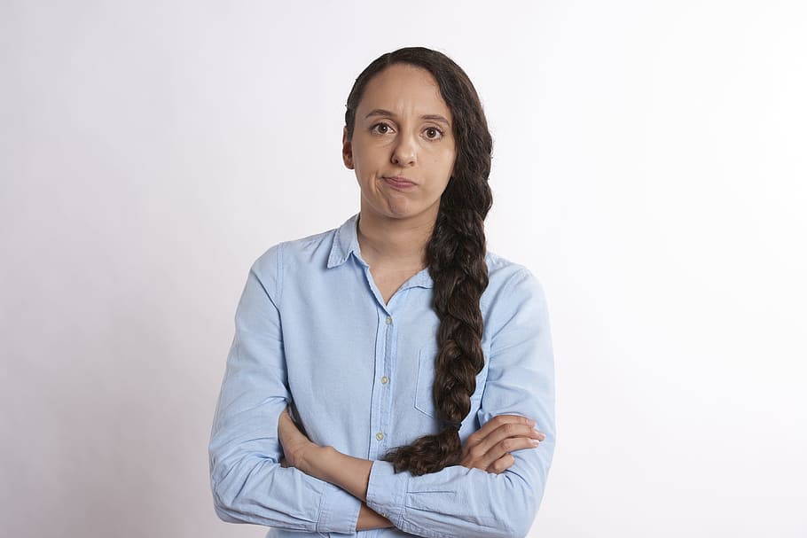 woman wearing blue dress shirt, frustrated, annoyed, person, people