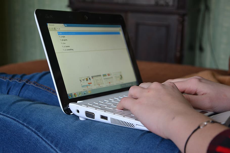 person using laptop while sitting inside room, computer, computers HD wallpaper
